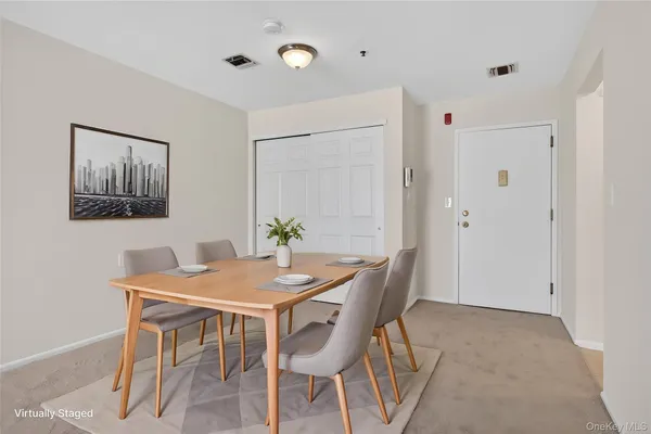a view of a dining room with furniture