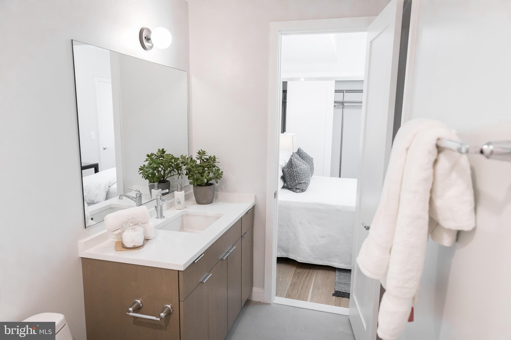 2248 Ontario Road Northwest, Unit 1 Washington, DC 20009 - Photo 19 of 23 Quartz countertops, Chrome Hardware