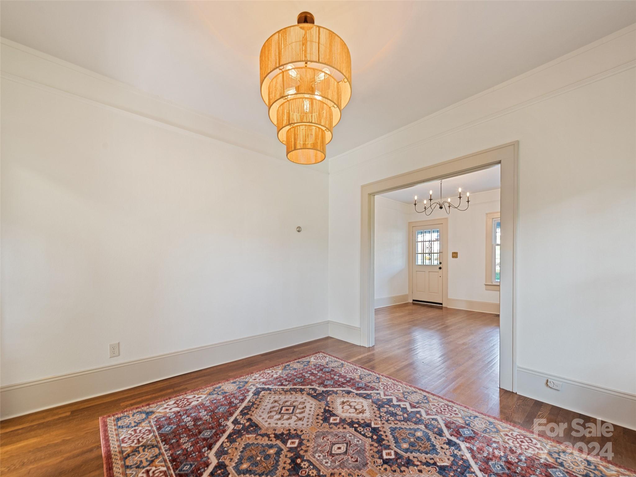 15 Scottdale Road Canton, NC 28716 - Photo 12 of 30 an empty room with window and wooden floor