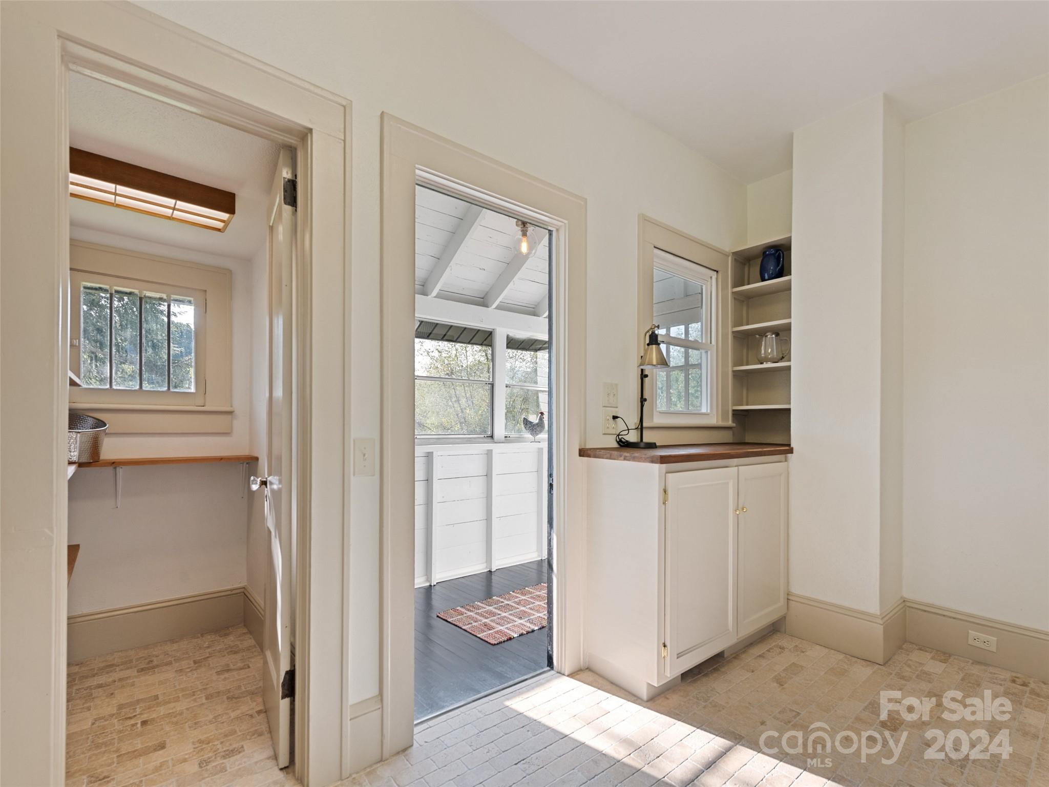 15 Scottdale Road Canton, NC 28716 - Photo 15 of 30 a view of a bathroom from the hallway
