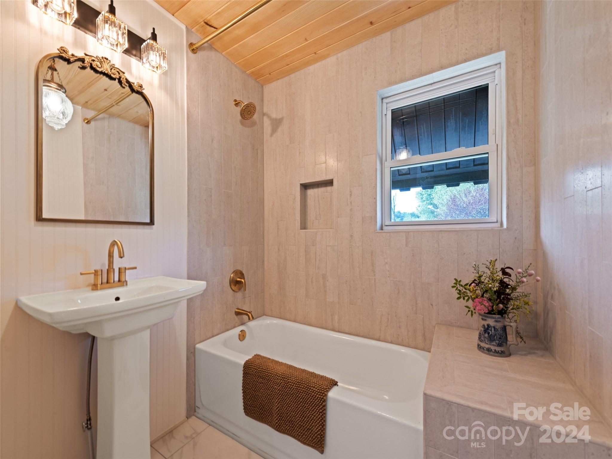 15 Scottdale Road Canton, NC 28716 - Photo 19 of 30 a bathroom with a sink and a mirror