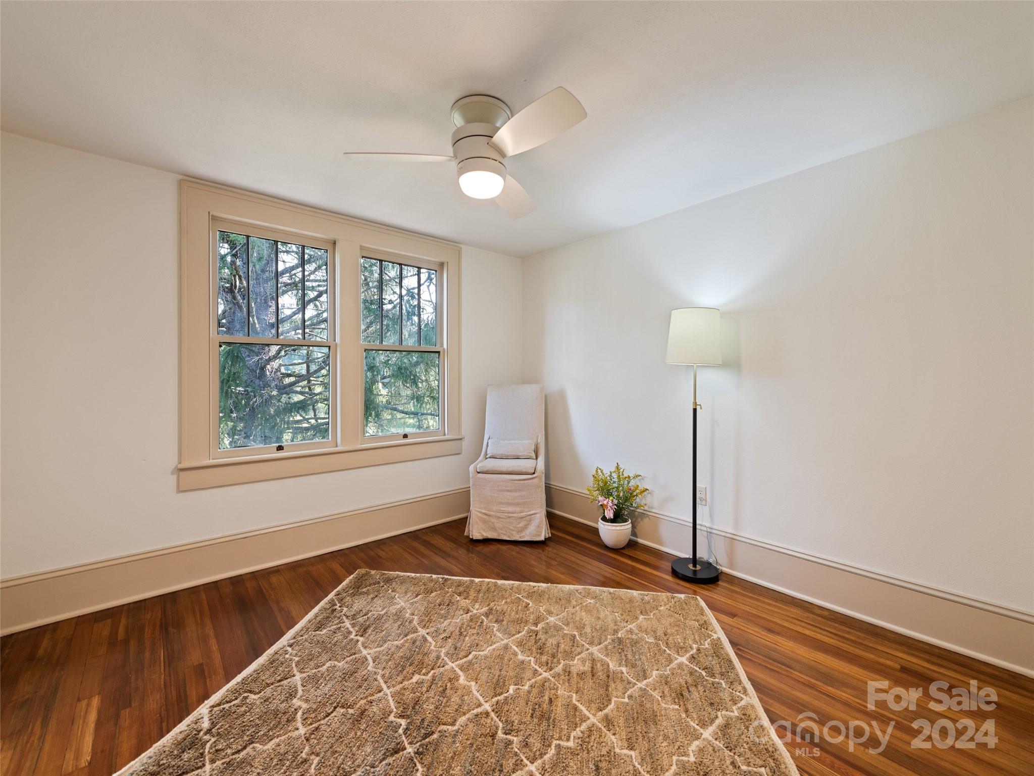 15 Scottdale Road Canton, NC 28716 - Photo 26 of 30 a bedroom with a bed and a window