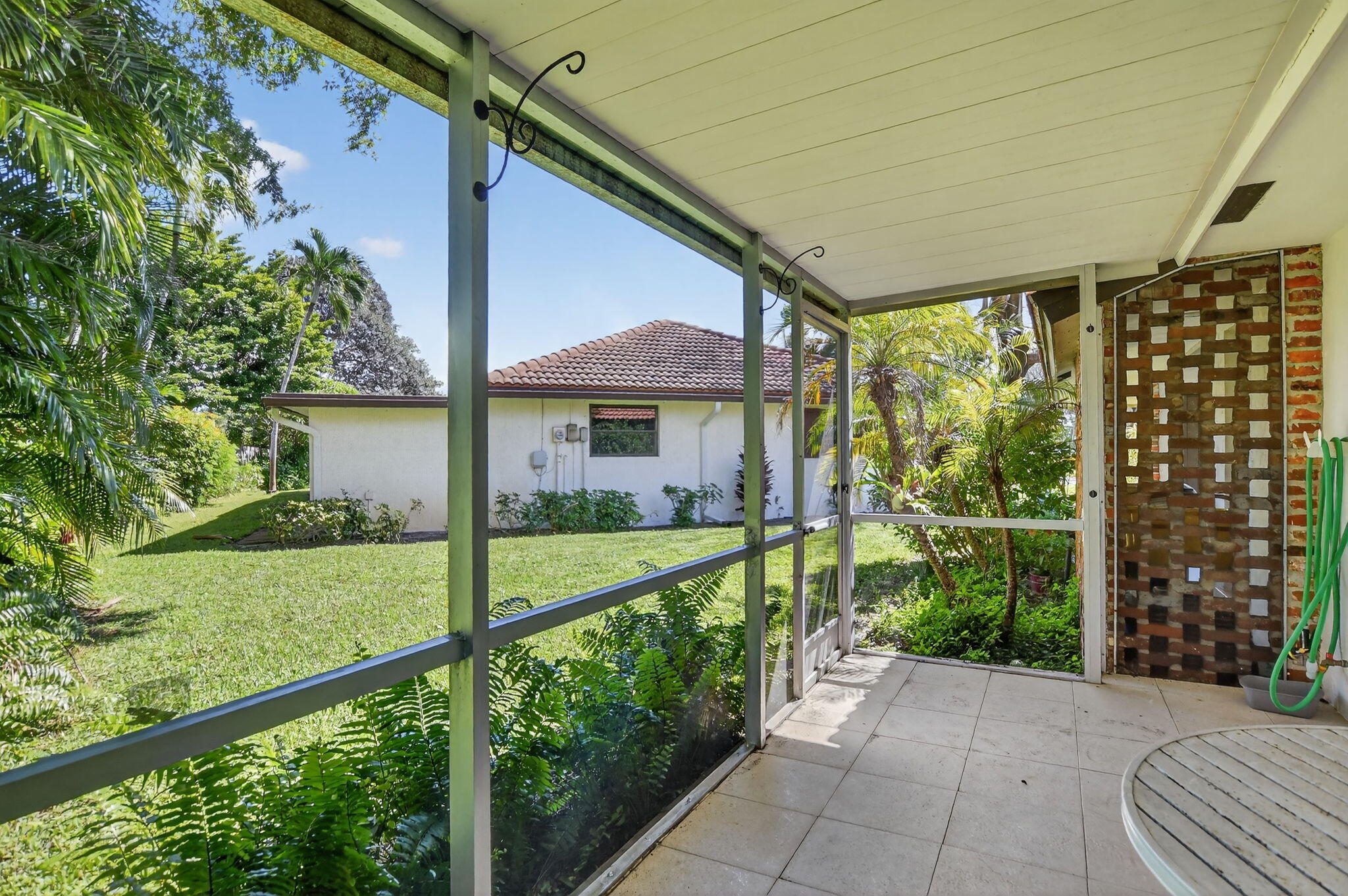 303 Northwest 42nd Street Boca Raton, FL 33431 - Photo 21 of 30 Screened Patio
