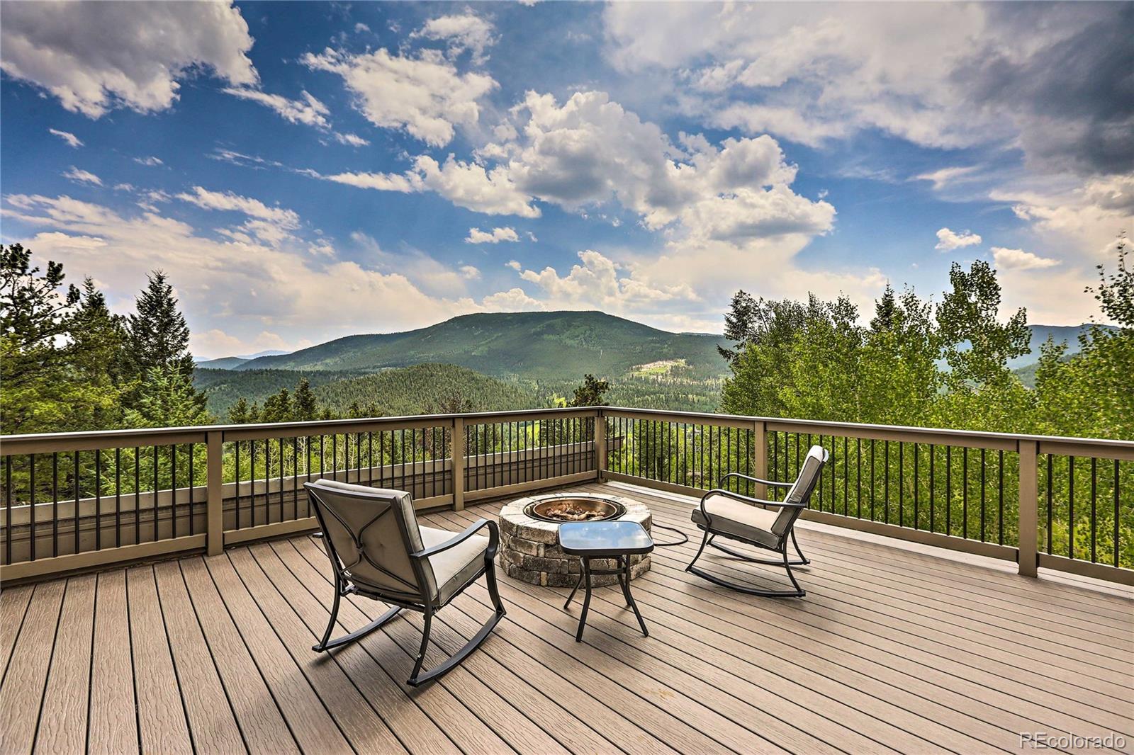 345 Old Sawmill Road Bailey, CO 80421 - Photo 34 of 39 a view of a roof deck with seating space
