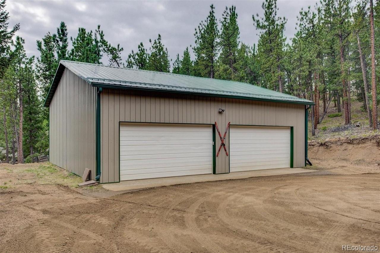 345 Old Sawmill Road Bailey, CO 80421 - Photo 36 of 39 a house with a outdoor space