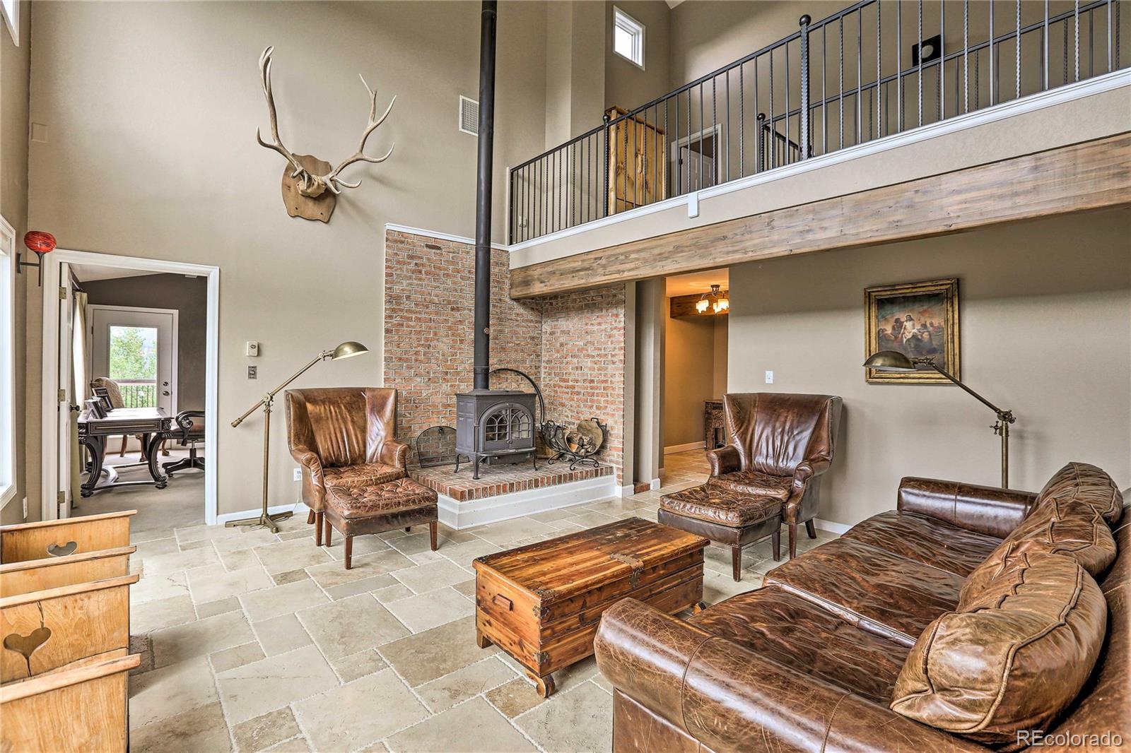 345 Old Sawmill Road Bailey, CO 80421 - Photo 5 of 39 a living room with furniture