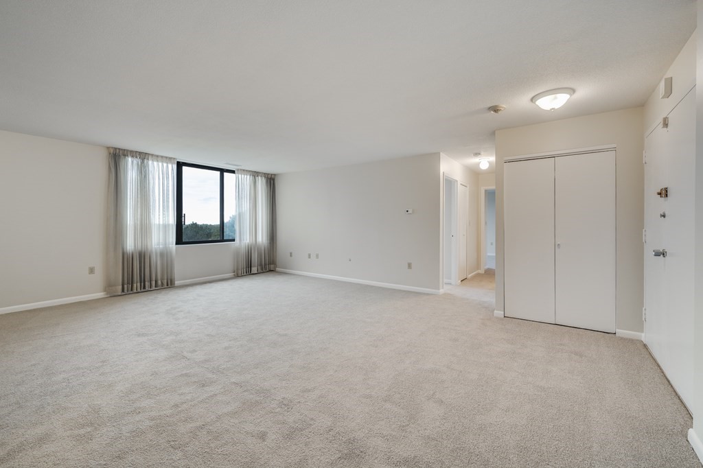 1002 Paradise Road, Unit PHE Swampscott, MA 01907 - Photo 11 of 23 a view of an empty room and window