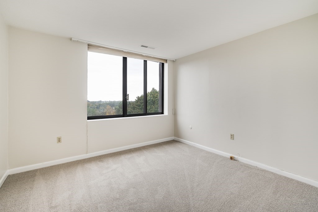 1002 Paradise Road, Unit PHE Swampscott, MA 01907 - Photo 15 of 23 a view of an empty room with a window