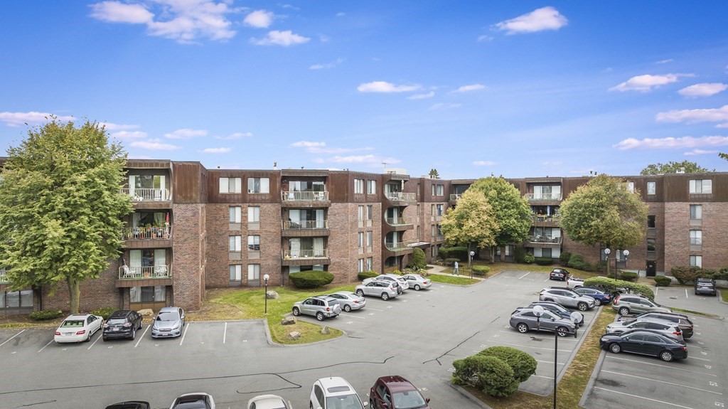 1002 Paradise Road, Unit PHE Swampscott, MA 01907 - Photo 5 of 23 a view of a patio with swimming pool and outdoor seating