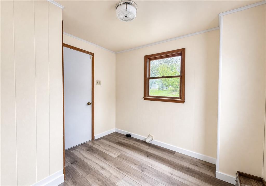 1106 Delaware Street Export, PA 15632 - Photo 16 of 26 a view of a room with wooden floor and a window