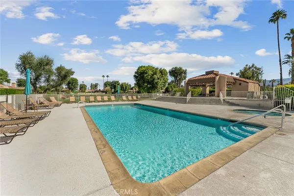 view of swimming pool with outdoor seating