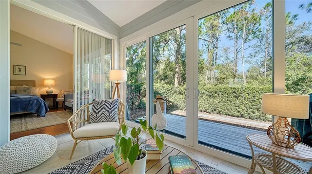 a living room with furniture and a window