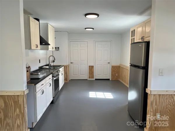 an empty room with windows
