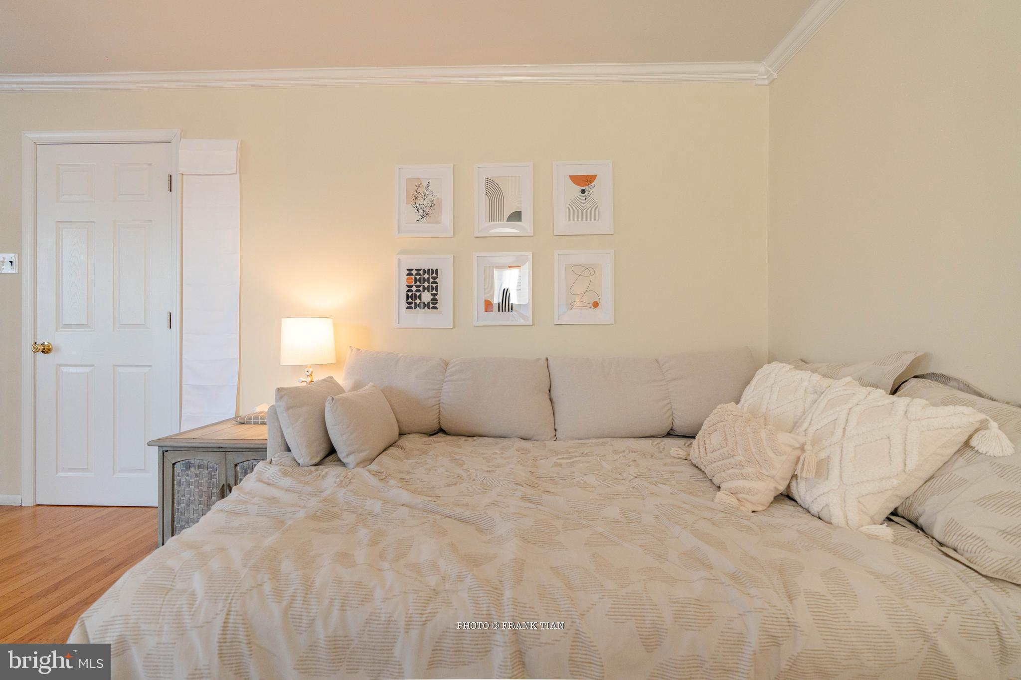 8 Ramsgate Road Cherry Hill, NJ 08003 - Photo 23 of 42 a bedroom with a bed and a painting on the wall