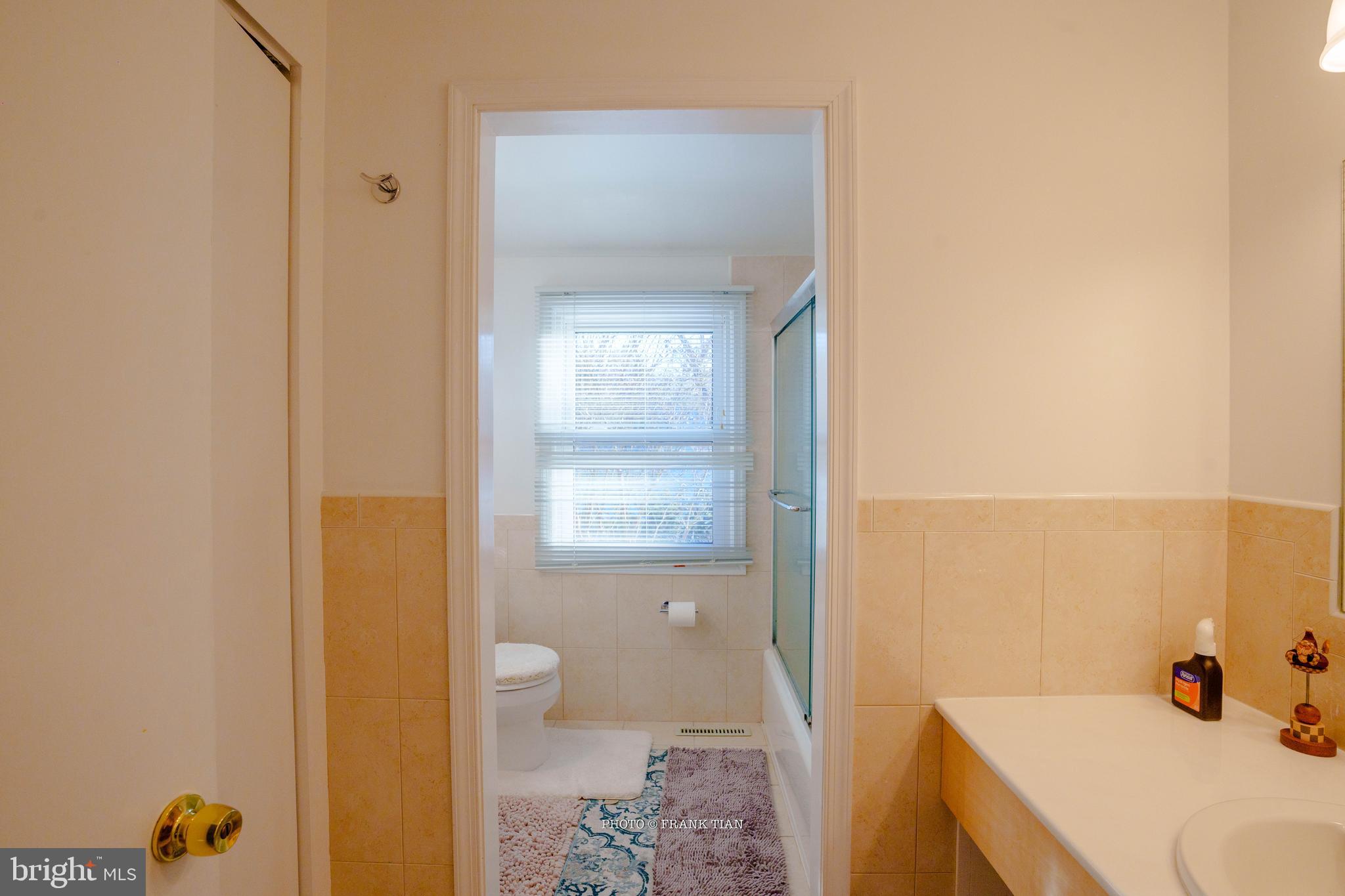 8 Ramsgate Road Cherry Hill, NJ 08003 - Photo 25 of 42 a bathroom with a sink a toilet and shower curtain