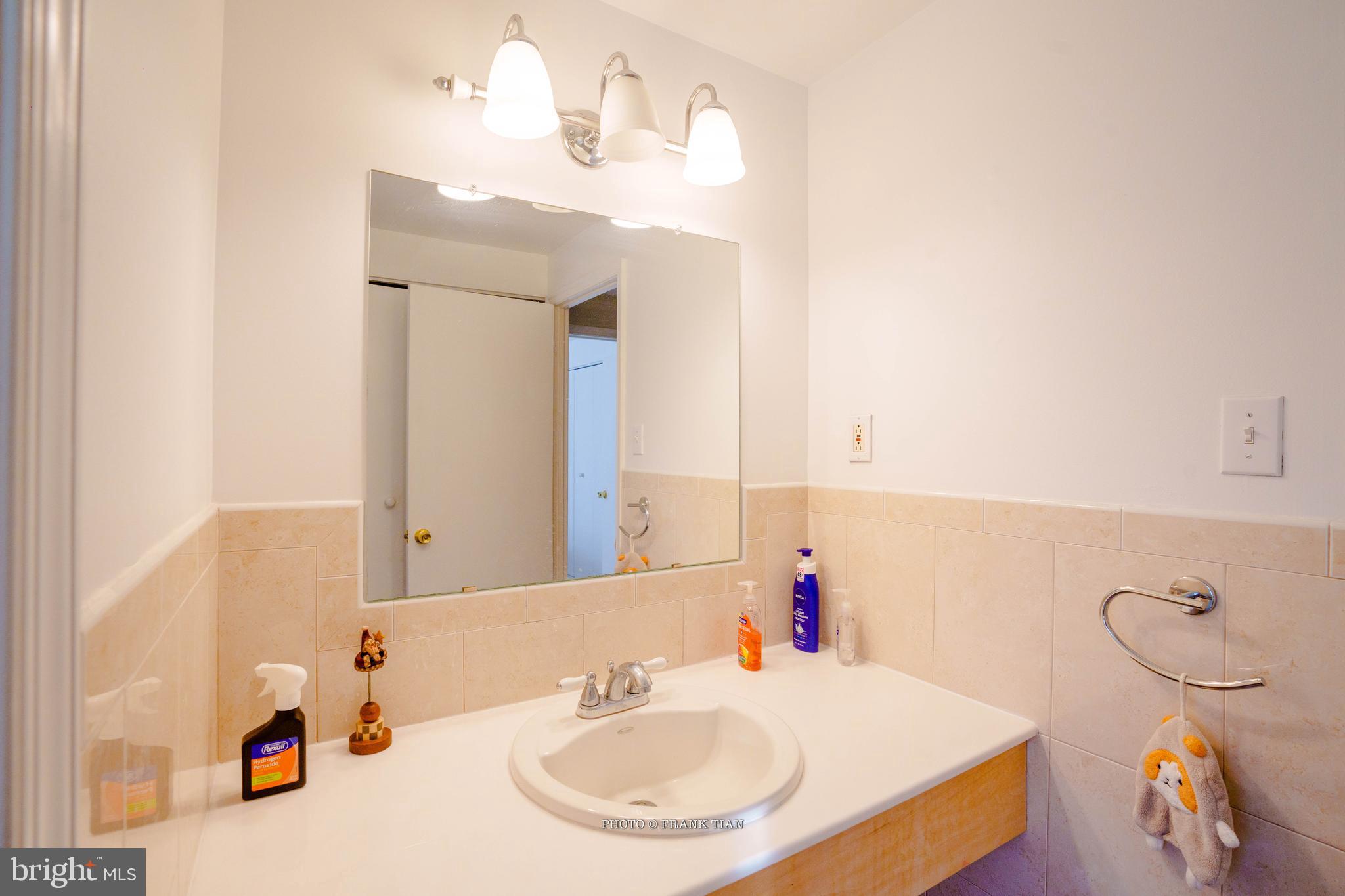 8 Ramsgate Road Cherry Hill, NJ 08003 - Photo 26 of 42 a bathroom with a sink and a mirror