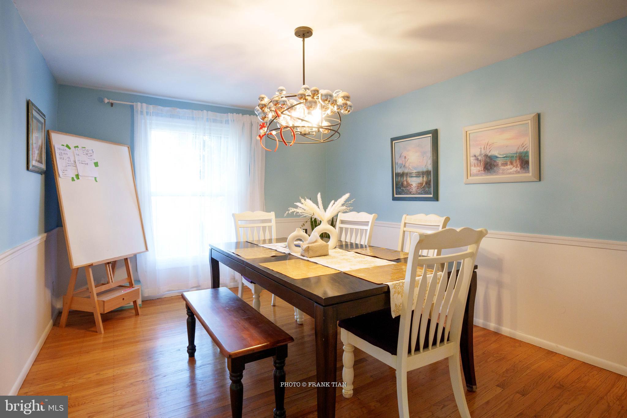 8 Ramsgate Road Cherry Hill, NJ 08003 - Photo 10 of 42 a view of a dining room with furniture wooden floor and a chandelier