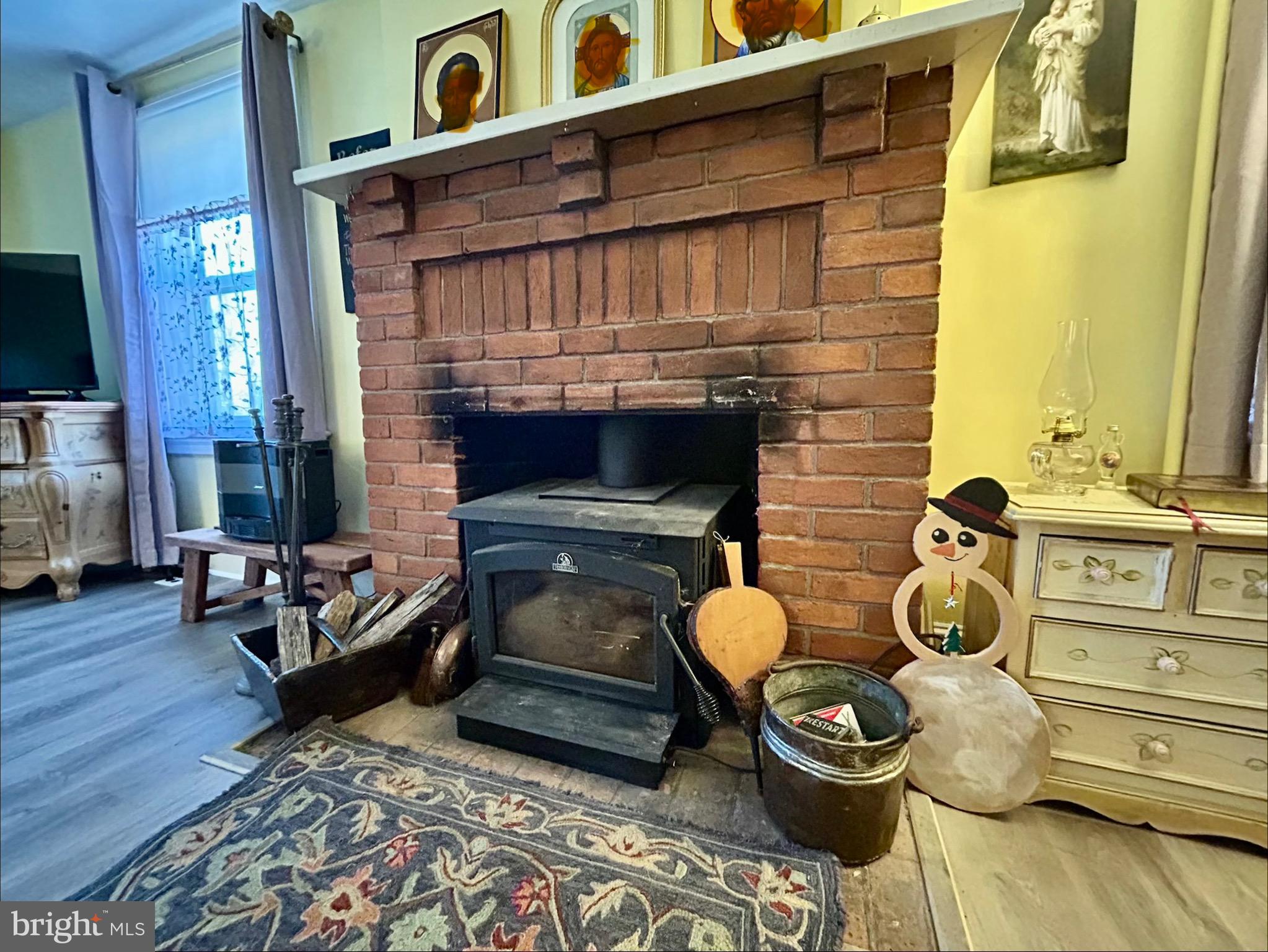 2415 Second Street Pike Newtown, PA 18940 - Photo 9 of 51 a view of living room with furniture and a fireplace