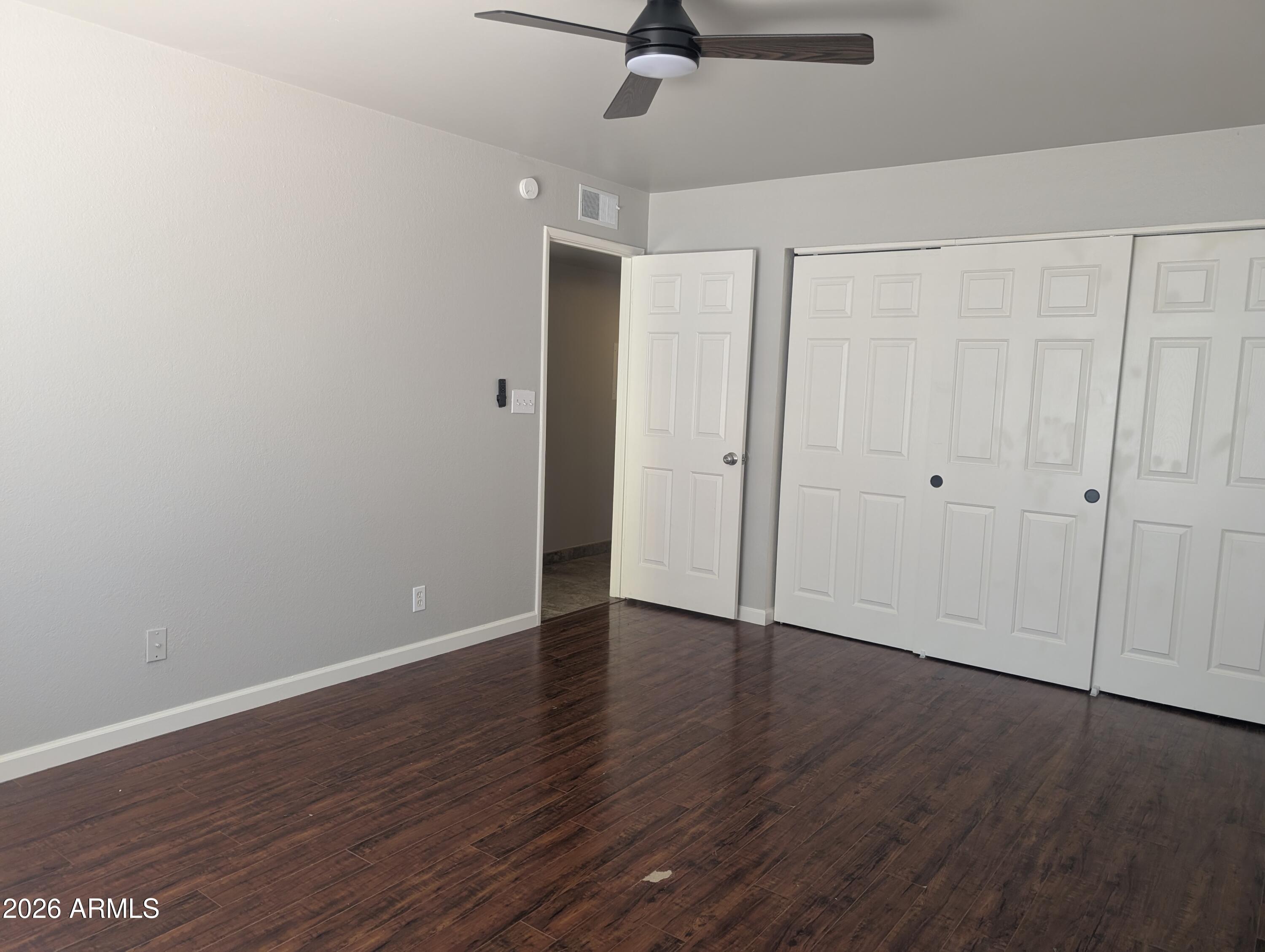 540 North May, Unit 1101 Mesa, AZ 85201 - Photo 10 of 15 Bedroom has large closet