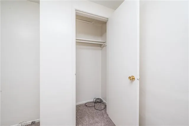 a bathroom with a granite countertop