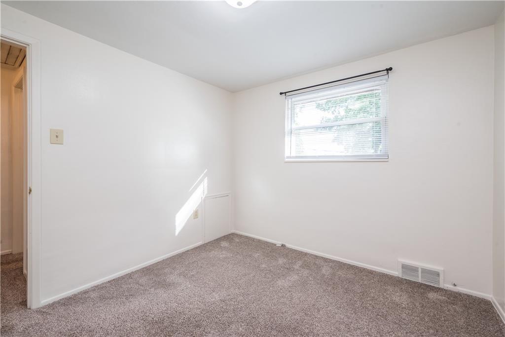334 Moon Clinton Road, Unit B Coraopolis, PA 15108 - Photo 35 of 46 an empty room with a window