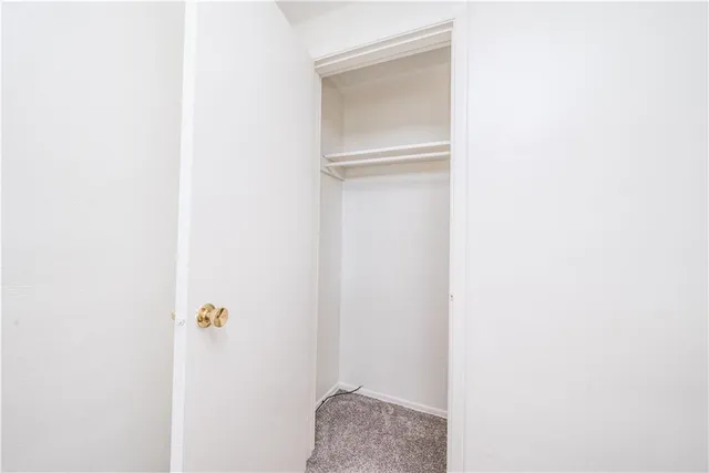 a view of hallway with closet