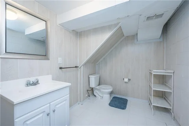 a bathroom with a sink and a toilet
