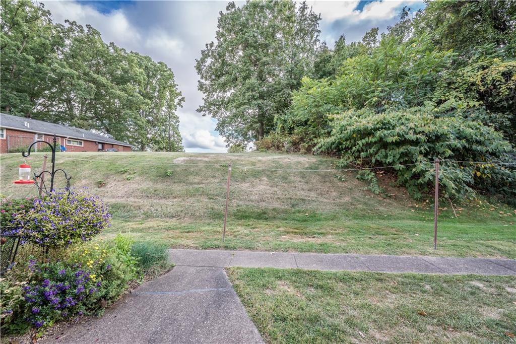 334 Moon Clinton Road, Unit B Coraopolis, PA 15108 - Photo 45 of 46 a view of backyard with green space