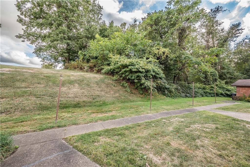 334 Moon Clinton Road, Unit B Coraopolis, PA 15108 - Photo 46 of 46 a view of a yard with an trees