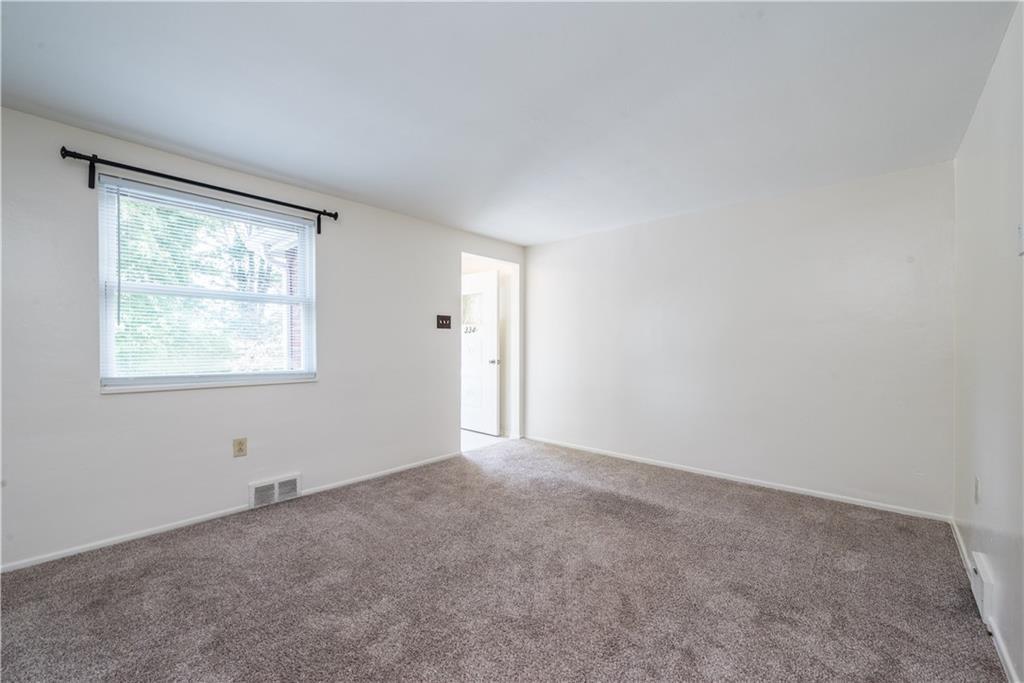 334 Moon Clinton Road, Unit B Coraopolis, PA 15108 - Photo 5 of 46 an empty room with windows