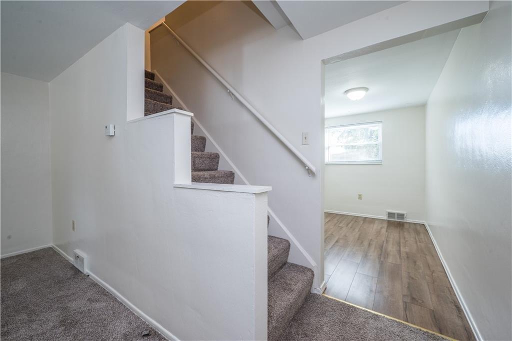 334 Moon Clinton Road, Unit B Coraopolis, PA 15108 - Photo 10 of 46 a view of a hallway with stairs