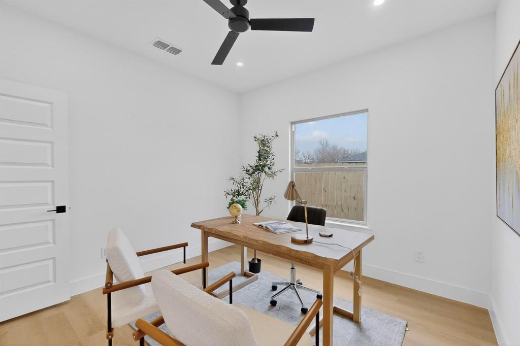 10166 Budtime Lane Dallas, TX 75217 - Photo 21 of 34 a workspace with furniture and wooden floor
