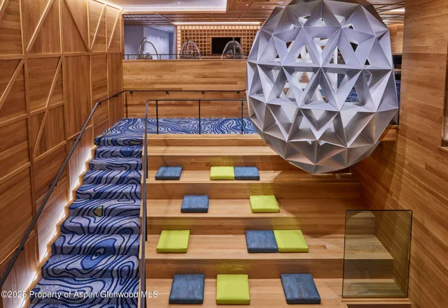 a view of building with glass windows