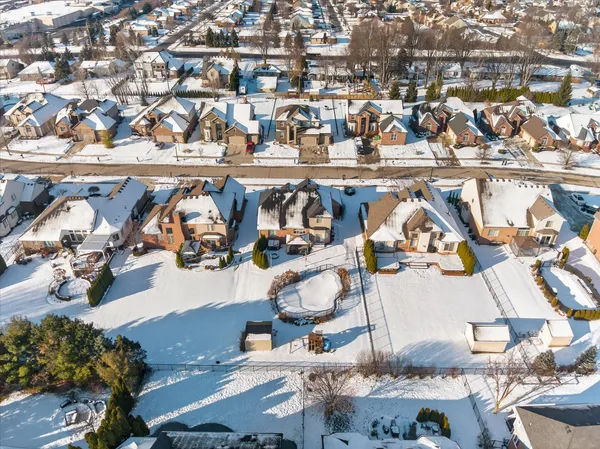 $600,000 | 47376 Hidden Meadows Drive, Macomb, MI 48044