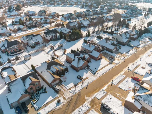 $600,000 | 47376 Hidden Meadows Drive, Macomb, MI 48044