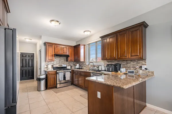 $600,000 | 47376 Hidden Meadows Drive, Macomb, MI 48044