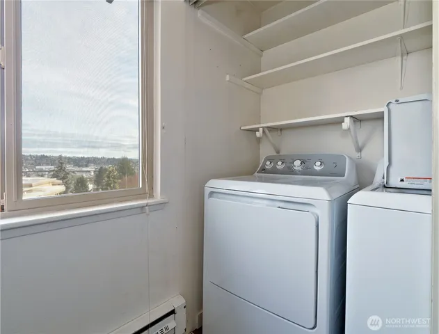 a utility room with dryer and washer
