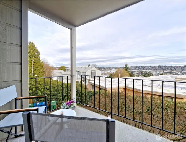 a sitting area with city view