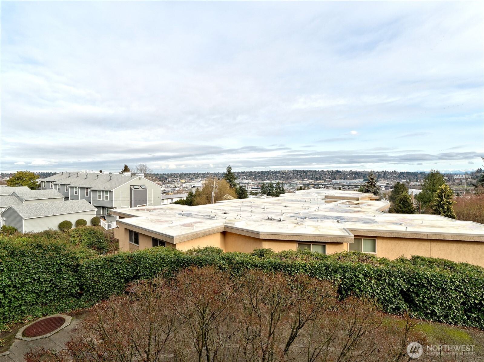 3700 25th Place West, Unit 202 Seattle, WA 98199 - Photo 20 of 21 a view of an ocean and beach