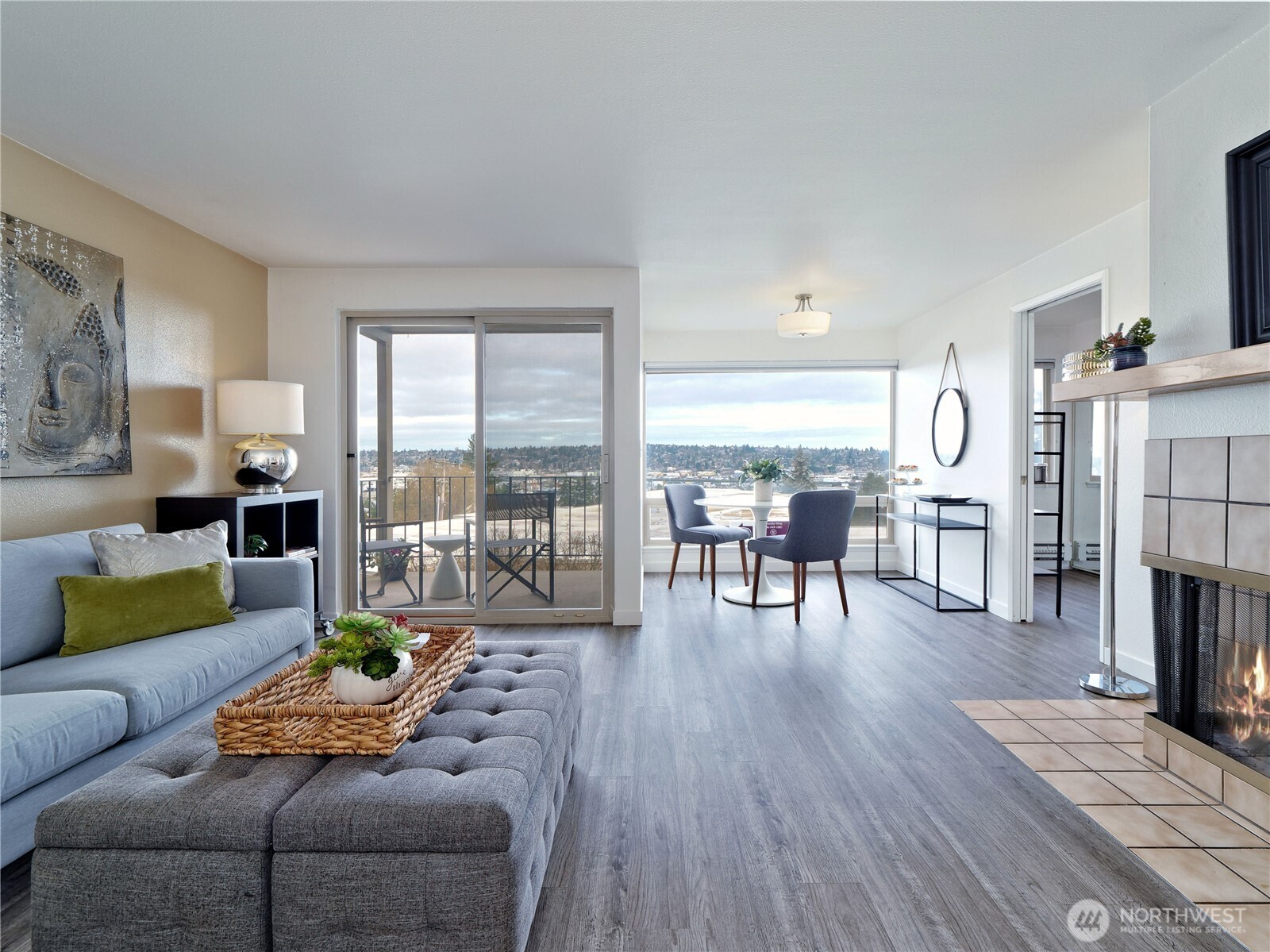 3700 25th Place West, Unit 202 Seattle, WA 98199 - Photo 3 of 21 a living room with furniture and a wooden floor