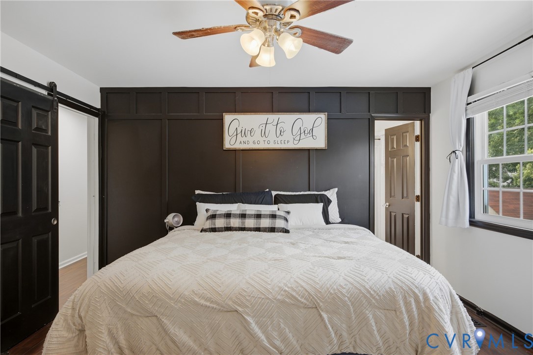 3724 Conduit Road Colonial Heights, VA 23834 - Photo 18 of 41 Bedroom featuring a decorative accent wall with pa