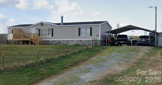 5458 Bill Sain Road Vale, NC 28168 - Photo 1 of 1 a front view of a house with a yard