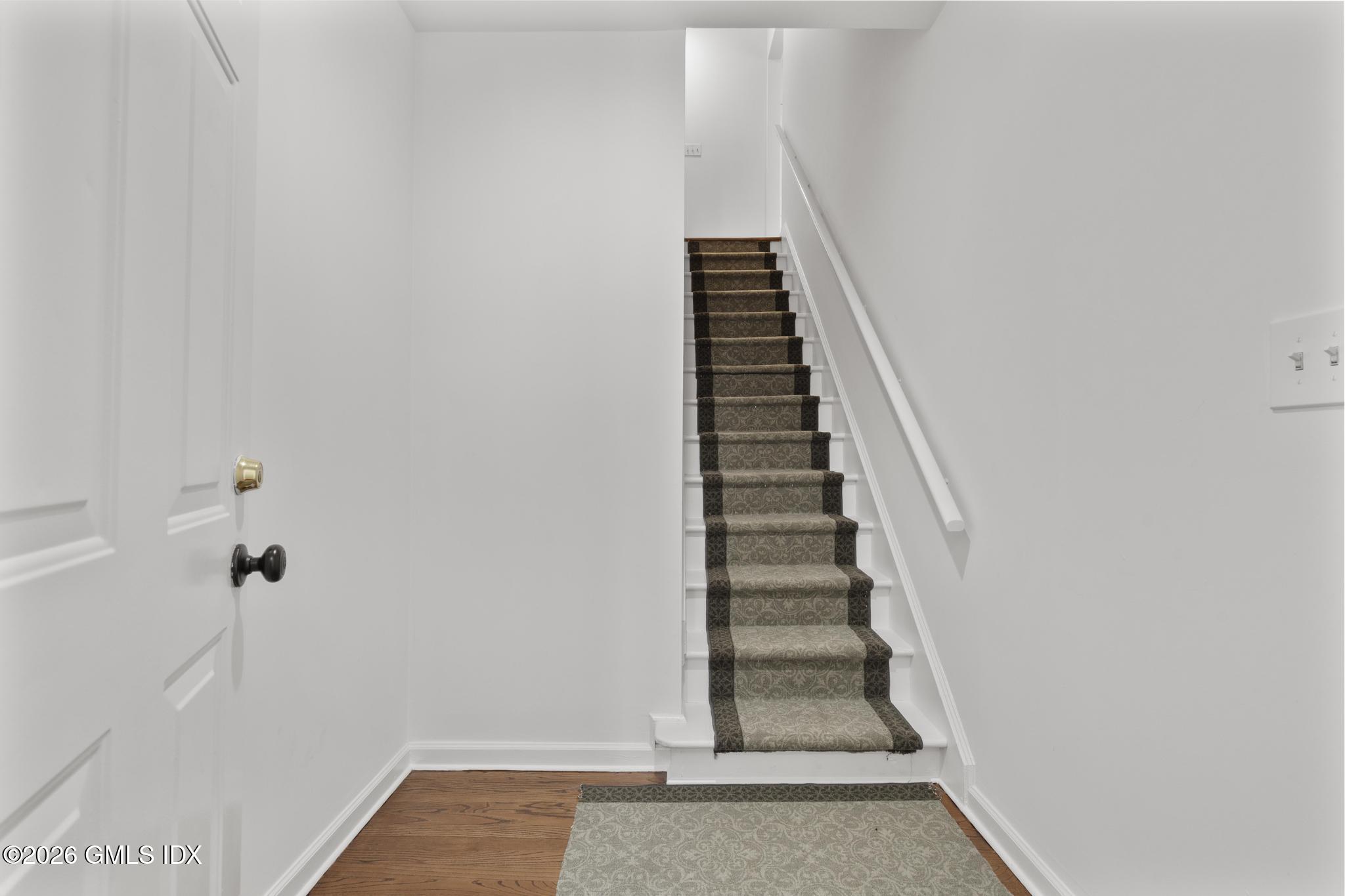 a view of an entryway with staircase