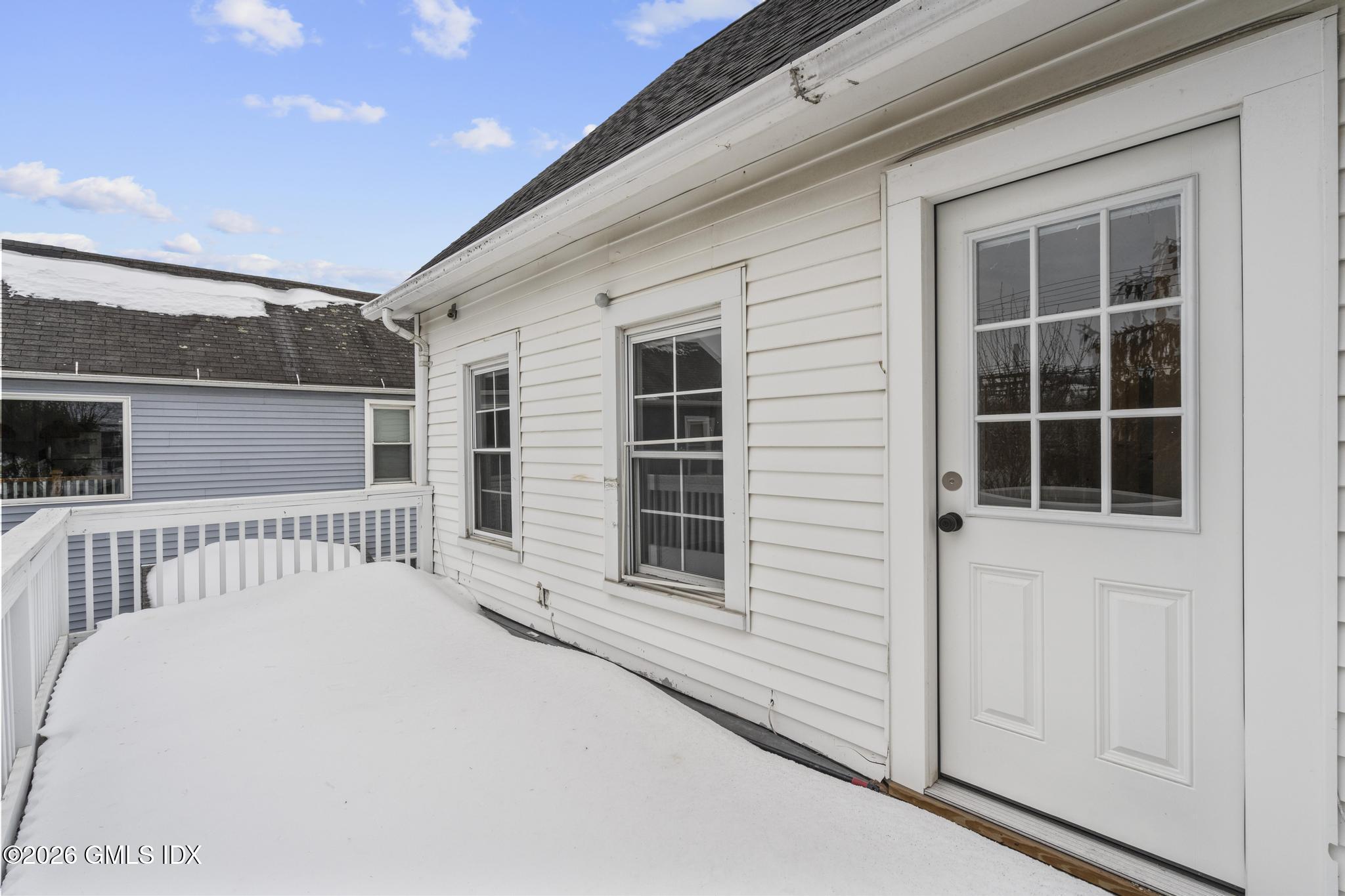 134 River Rd Extension, Unit 2 Cos Cob, CT 06807 - Photo 13 of 19 a view of a house with a large window