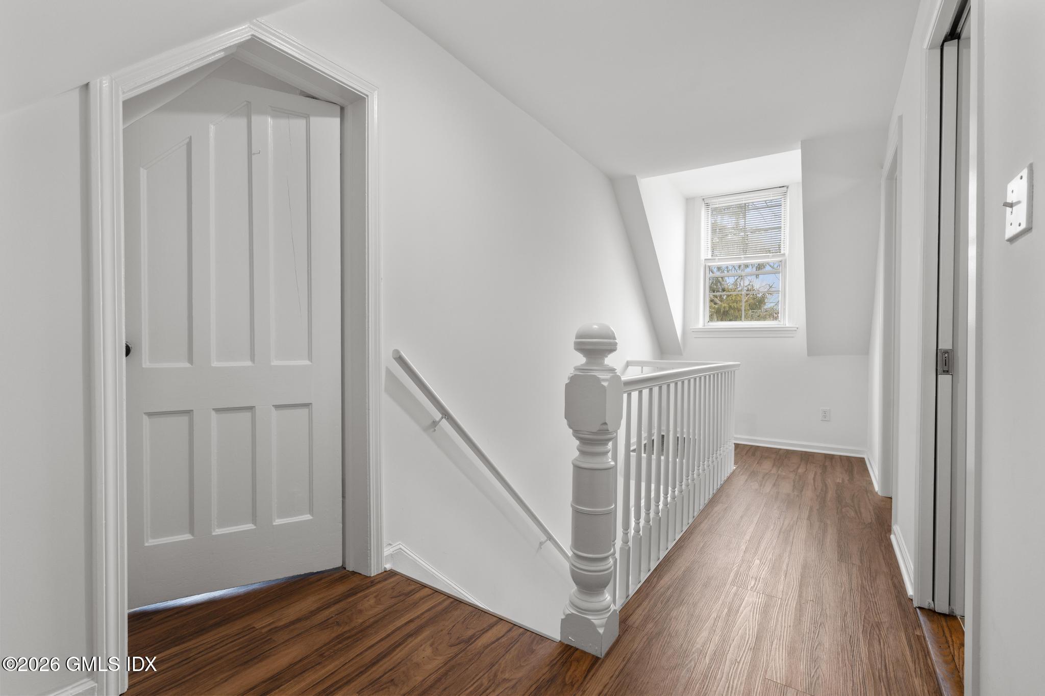 134 River Rd Extension, Unit 2 Cos Cob, CT 06807 - Photo 15 of 19 a view of entryway with wooden floor