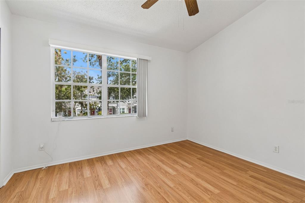 382 Countryside Key Boulevard Oldsmar, FL 34677 - Photo 26 of 58 an empty room with windows