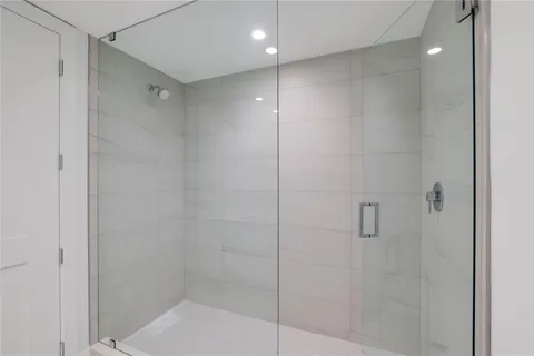 a utility room with sink dryer and washer