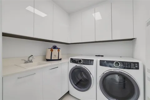 a view of swimming pool with outdoor seating and plants