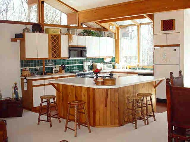 545 Norton Road Otis, MA 01029 - Photo 3 of 4 a room with stainless steel appliances a sink and a large window