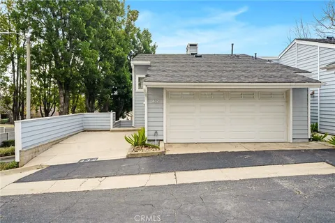 a view of a house with a garage